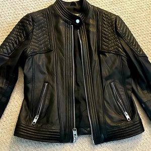 Women’s black leather jacket, size small. Excellent condition.